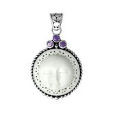 Handmade sterling silver Balinese pendant with carved bone moon face and Amethyst Quartz accents.